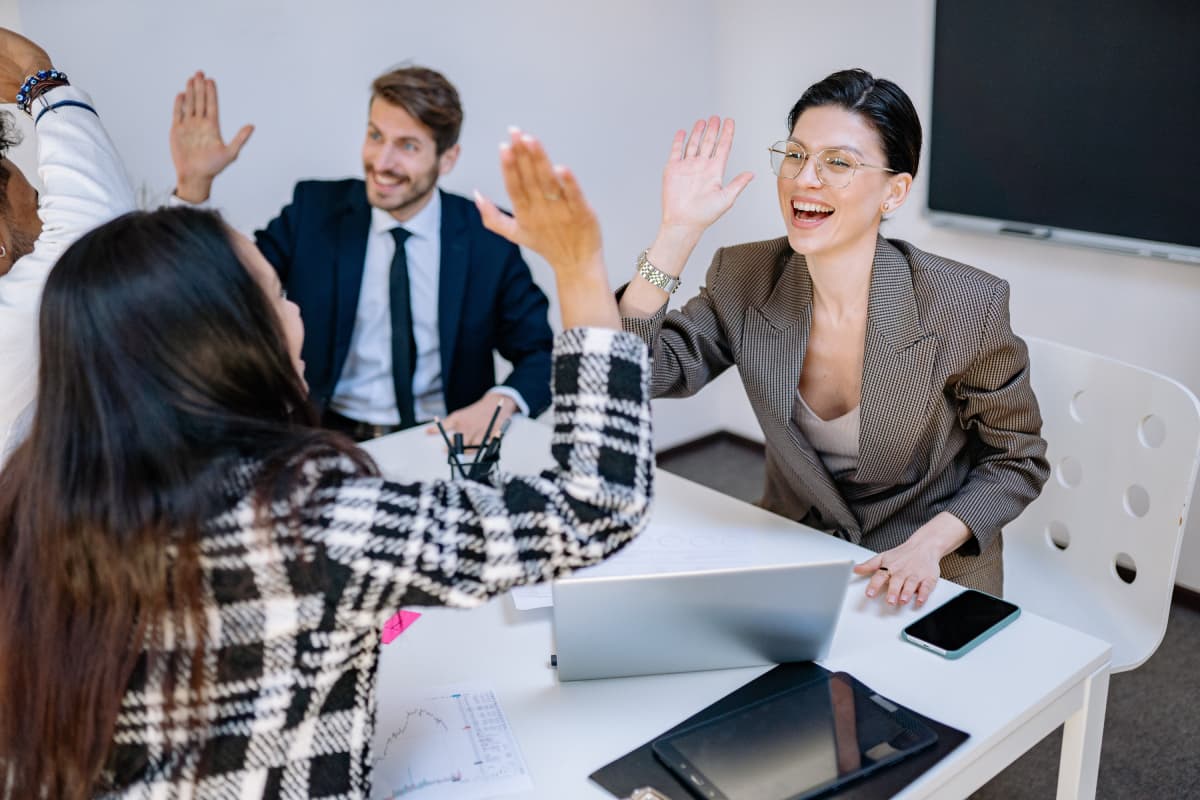 Happy Employees Doing High Five