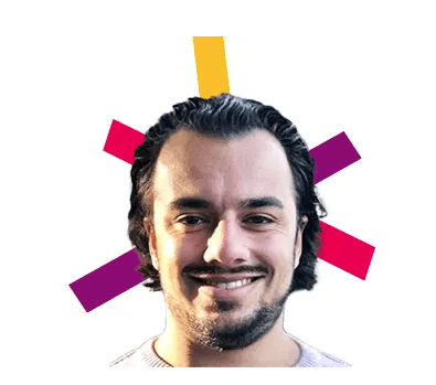 Benjamin Royal is square on and grinning at the camera